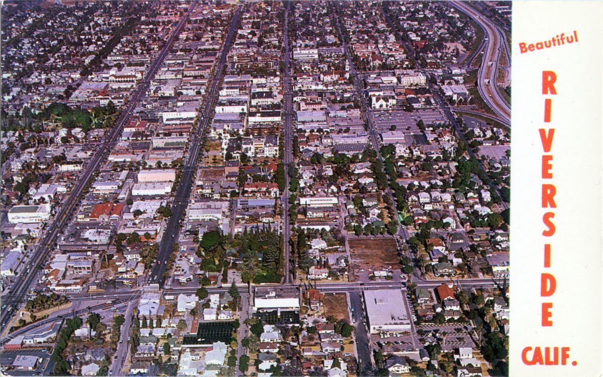 Circa 1960 – View looking north over downtown Riverside (RXSQ)